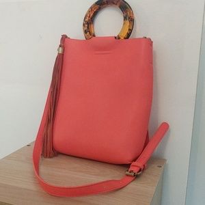 Tasseled crossbody bag